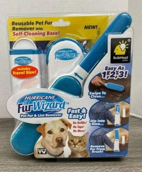 Reusable Dog and Cat Fur Remover tool being used on a fabric sofa to pick up pet hair.