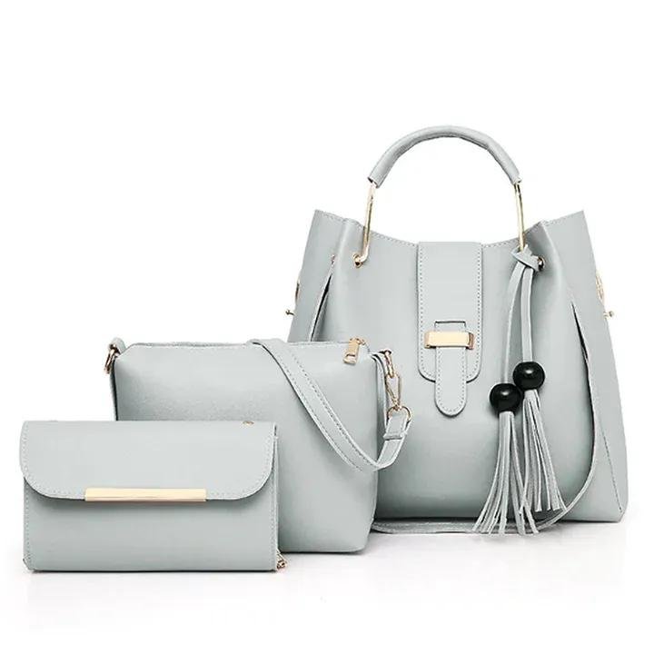 A stylish pink women's PU leather handbag set, showing a tote bag and a crossbody bag placed side-by-side.