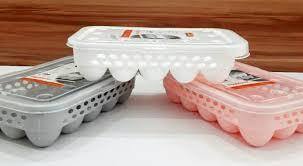 Durable multicolor ABS plastic refrigerator egg holder with transparent lid, holds 12 eggs, stackable and dishwasher-safe storage box